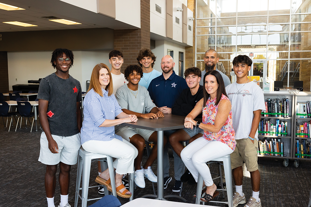 Current FCD Academy players with Lone Star High School Lead Counselor Leslie Warstler (Left), Principal Keith Tolleson (back middle), Assistant Principal Josh Rodriguez (back right), and Associate Principal Abby Cole (front right)