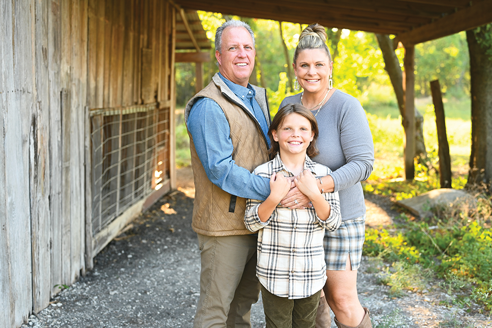 Erin with husband, Chris, and son, Brock. Photo courtesy Brooke Gibson Photography